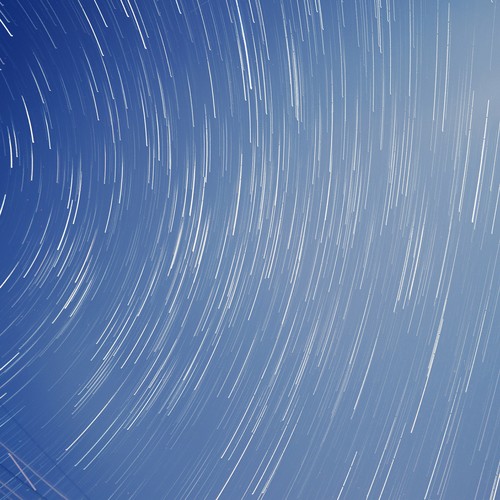 Star trails in sky due to timelapse and image stacking