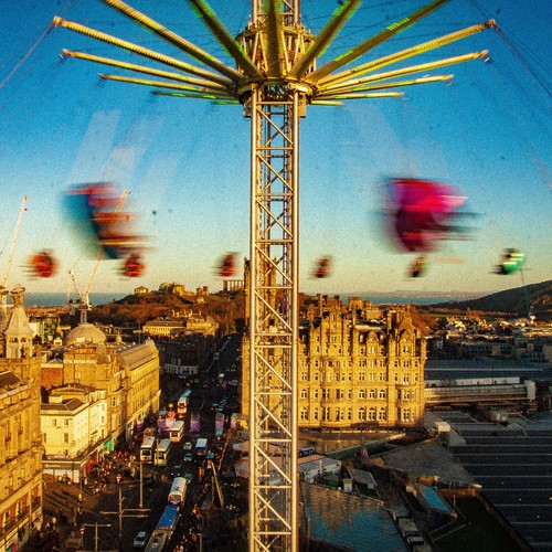 Amusement ride rotating high above Edinburgh