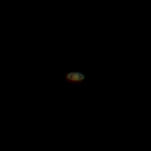 Saturn, as viewed from a telescope
